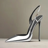 New silver patent leather flat buckle sandals with pointed edges and slim heels, stylish and stylish, worn in the backless style
