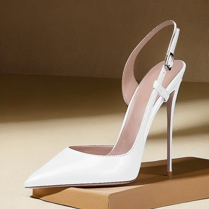 New silver patent leather flat buckle sandals with pointed edges and slim heels, stylish and stylish, worn in the backless style